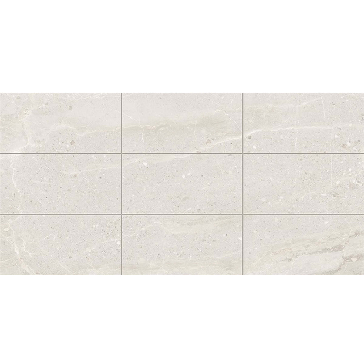 Monza 600x300mm SurfaceTec sola stone-look porcelain tiles in stacked arrangement showing natural mineral variation by Tilemall