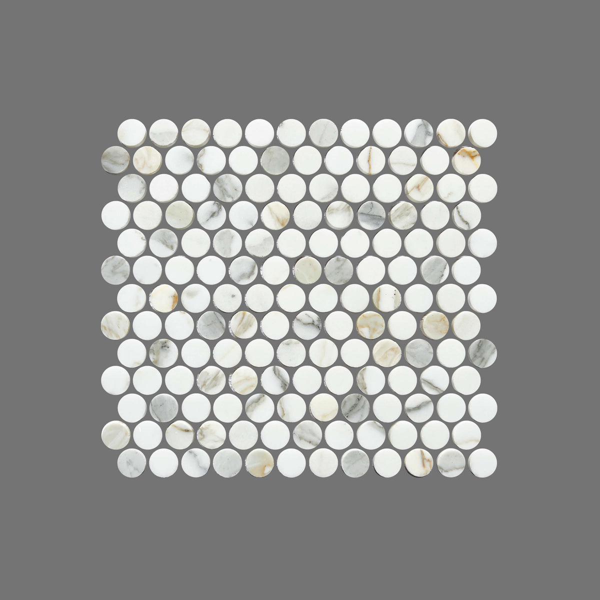 Artemis honed calacatta gold marble mosaic penny rounds 23x23mm in grid layout showing natural veining and shade by Tilemall