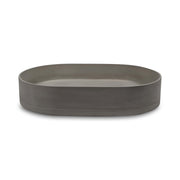 Nood Co Pill oval above-counter basin by Tilemall in mid tone grey, 580x380mm