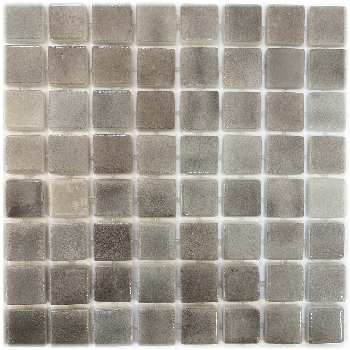 Leyla Amasya Mosaic 325x515x5.5mm glass tiles in grid layout showing natural shade variation from light to dark taupe by Tilemall