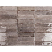 Toulouse 60x240mm gloss greige ceramic subway tiles in stacked bond layout showing natural colour variation by Tilemall