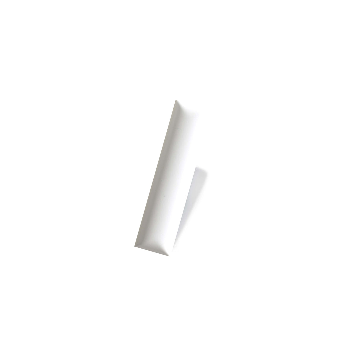 Pequeno 50x200mm satin white ceramic subway tiles by Tilemall angled on neutral background