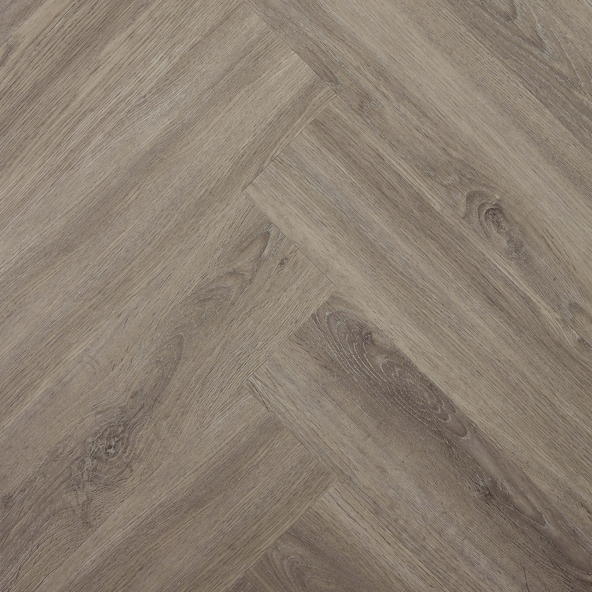 Easi-Plank Grey Stone 625x125mm hybrid flooring installed in herringbone pattern with matte finish by Tilemall
