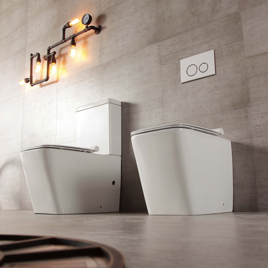 BelBagno Ardente-R toilets installed in bathroom interior with wall-mounted GEBERIT flush plate and industrial lighting by Tilemall