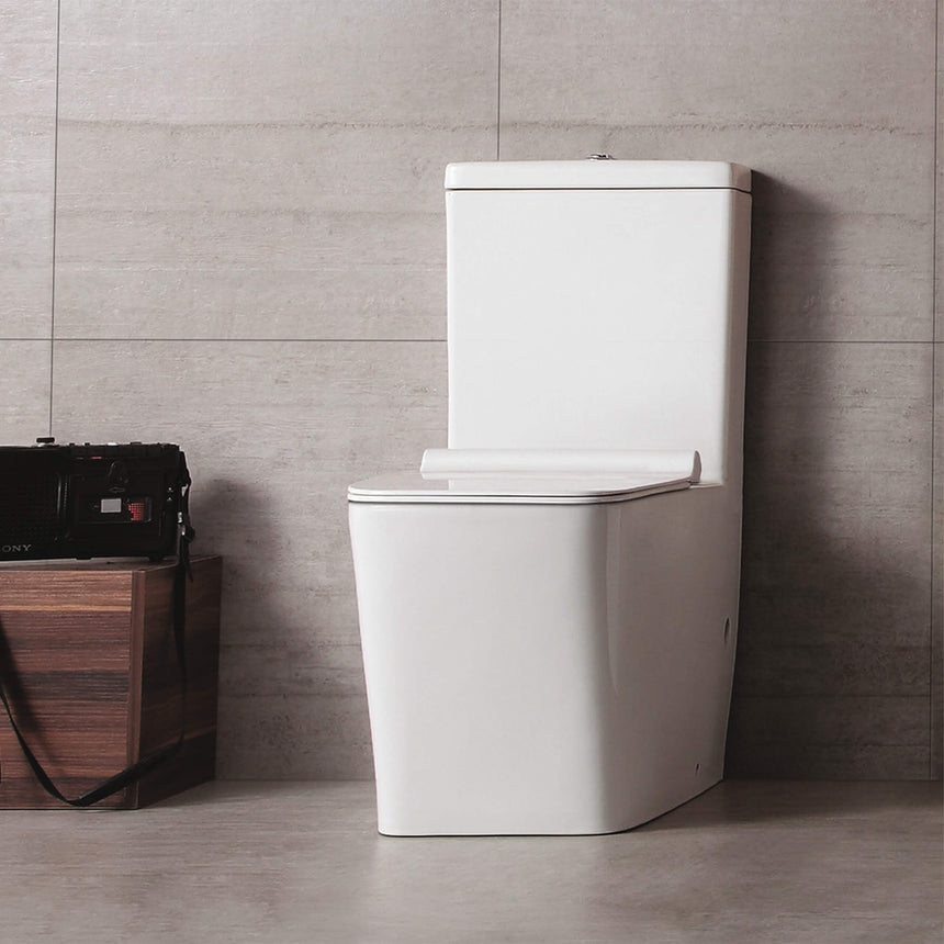 BelBagno Ardente-R white rimless toilet suite installed in bathroom interior with neutral tile wall by Tilemall
