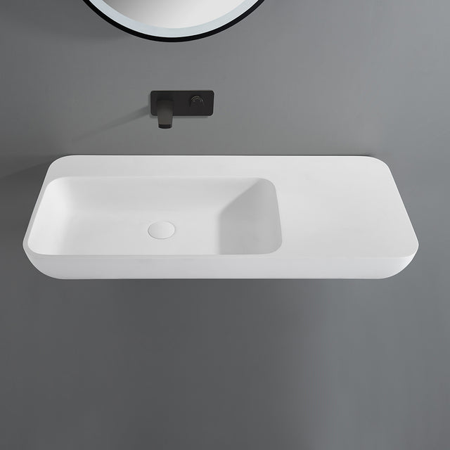 Lukka Rocca 900x400mm matte white solid surface wall-hung basin by Tilemall with black wall-mounted tap
