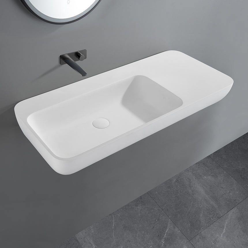 Lukka Rocca 900x400mm matte white wall-hung basin installed with black lever tap in bathroom interior by Tilemall
