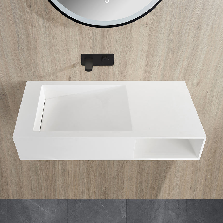 Top-down view of Lukka Crete 1000x460mm wall-hung basin showing rectangular bowl, overflow slot and right-side shelf by Tilemall