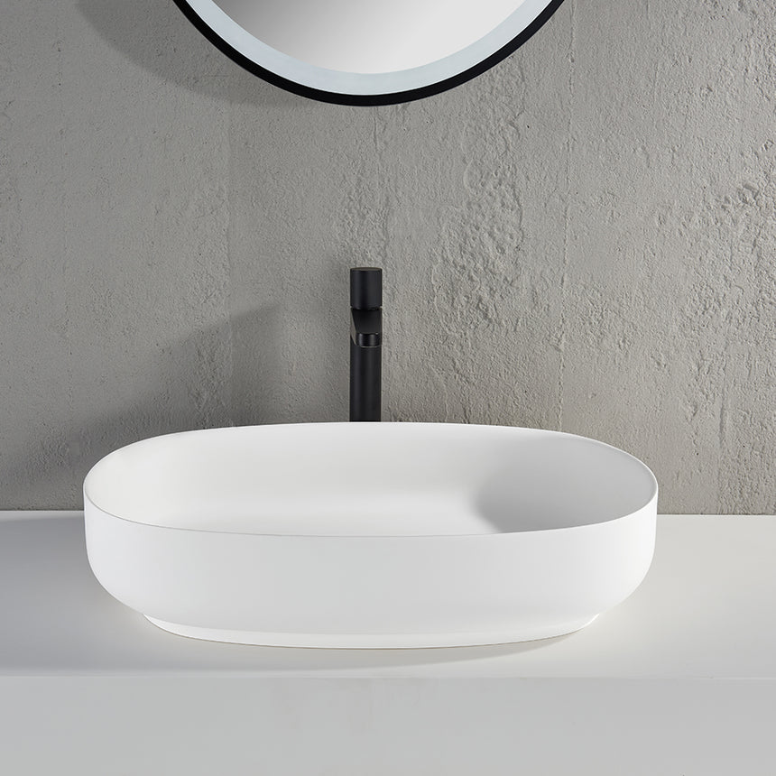 Lukka ellips 600x400mm matte white solid surface basin side view showing rounded rim by Tilemall