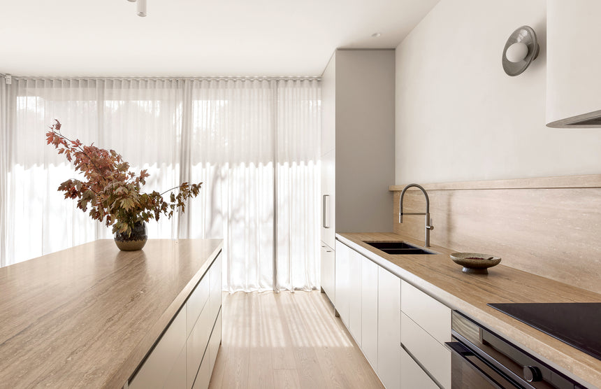 Phoenix Prize Flexible Coil Sink Mixer 220mm Brushed Nickel, shown in a finished interior