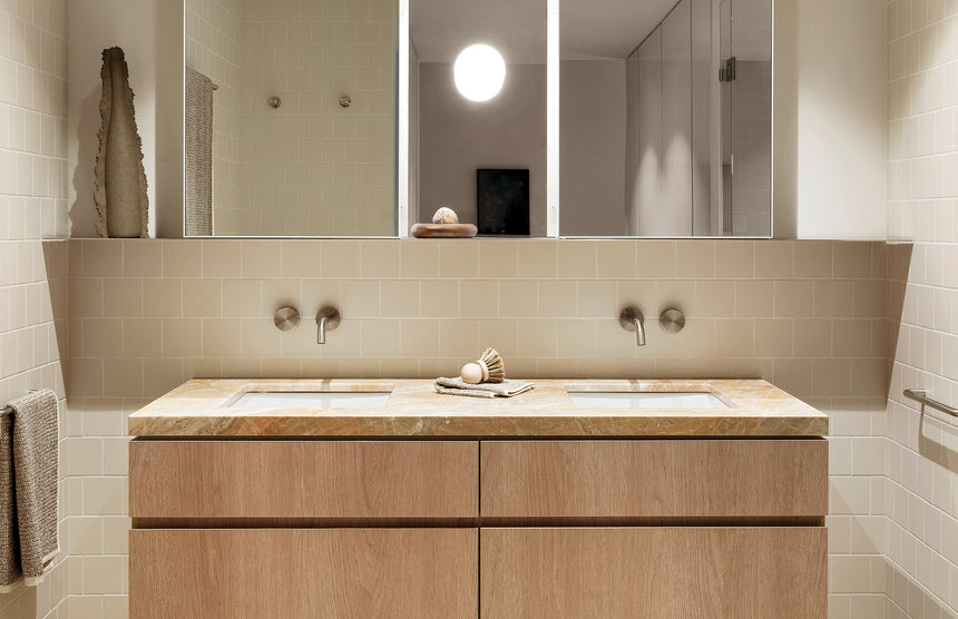Phoenix Vivid Slimline Plus Wall Basin / Bath Outlet 180mm Brushed Nickel, shown in a finished interior