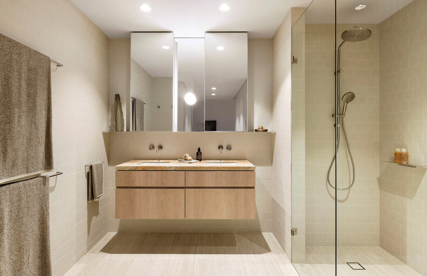 Phoenix Ormond Twin Shower Brushed Nickel, shown in a finished interior