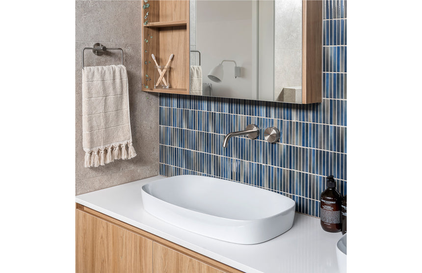 Phoenix Radii Hand Towel Holder Round Plate Brushed Nickel, shown in a finished interior