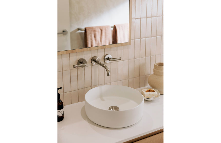 Phoenix 40mm Dome Pop Up Universal Waste Brushed Nickel, shown in a finished interior