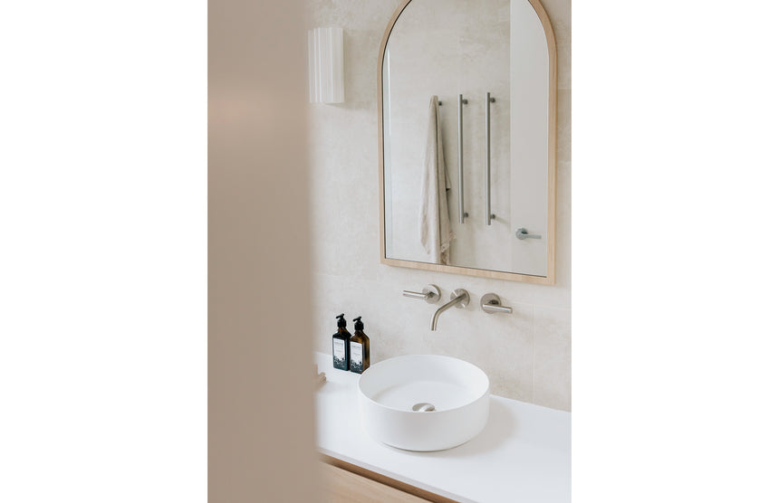 Phoenix Vivid Slimline Plus Lever Wall Top Assemblies Brushed Nickel, shown in a finished interior