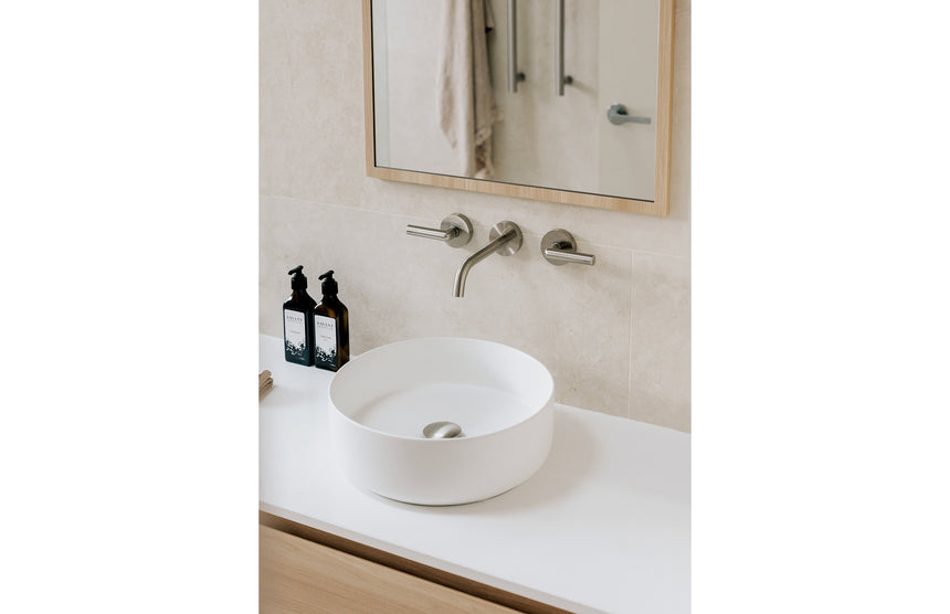 Phoenix 40mm Dome Pop Up Universal Waste Brushed Nickel, shown in a finished interior