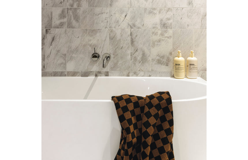 Phoenix Vivid Slimline Plus Wall Basin / Bath Outlet 180mm Chrome, shown in a finished interior