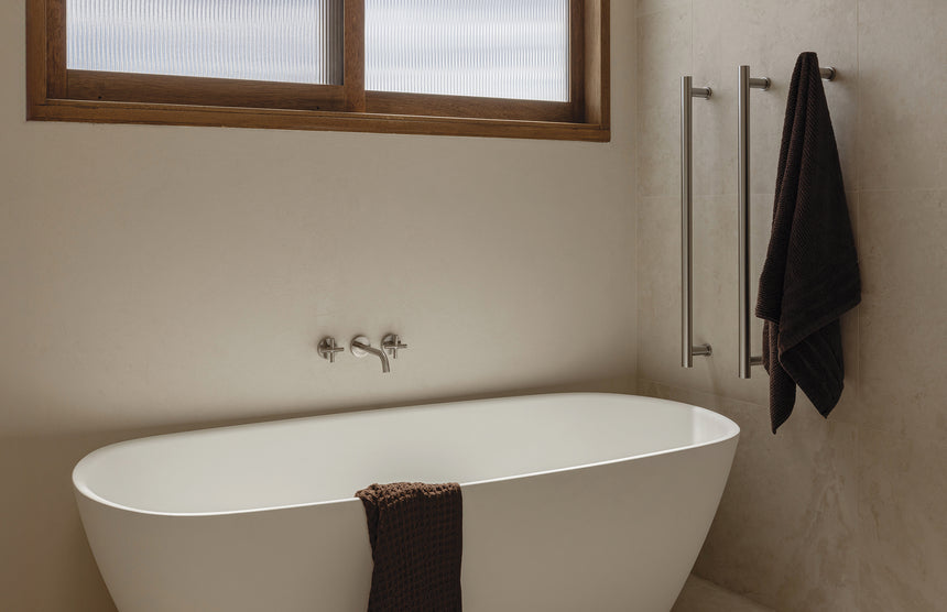 Phoenix Vivid Slimline Plus Wall Top Assemblies Brushed Nickel, shown in a finished interior