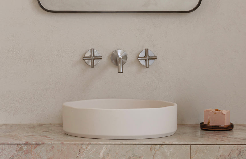 Phoenix Vivid Slimline Plus Wall Basin / Bath Outlet 180mm Brushed Nickel, shown in a finished interior