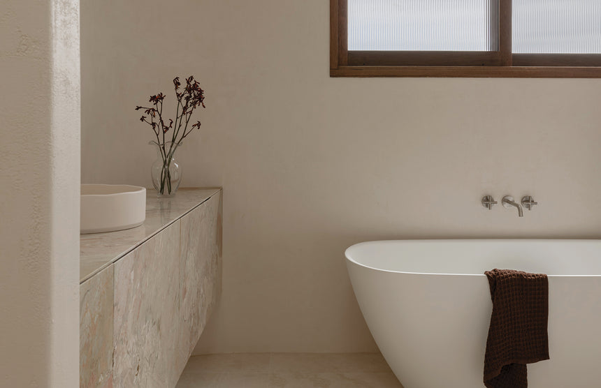 Phoenix Vivid Slimline Plus Wall Basin / Bath Outlet 180mm Brushed Nickel, shown in a finished interior