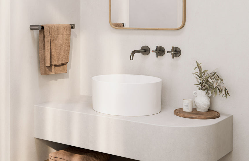 Phoenix Vivid Slimline Plus Wall Basin / Bath Hostess Set 180mm Outlet Brushed Carbon, shown in a finished interior
