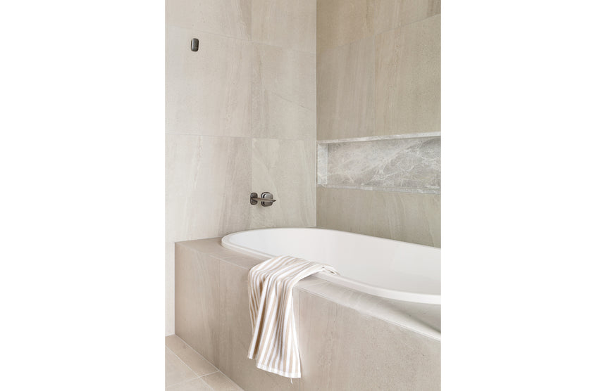 Phoenix Nuage Wall Basin / Bath Mixer Set 200mm Brushed Carbon, shown in a finished interior