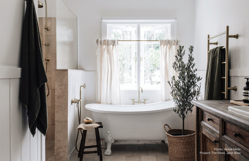 Phoenix Cromford Exposed Sink Set Brushed Gold, shown in a finished interior
