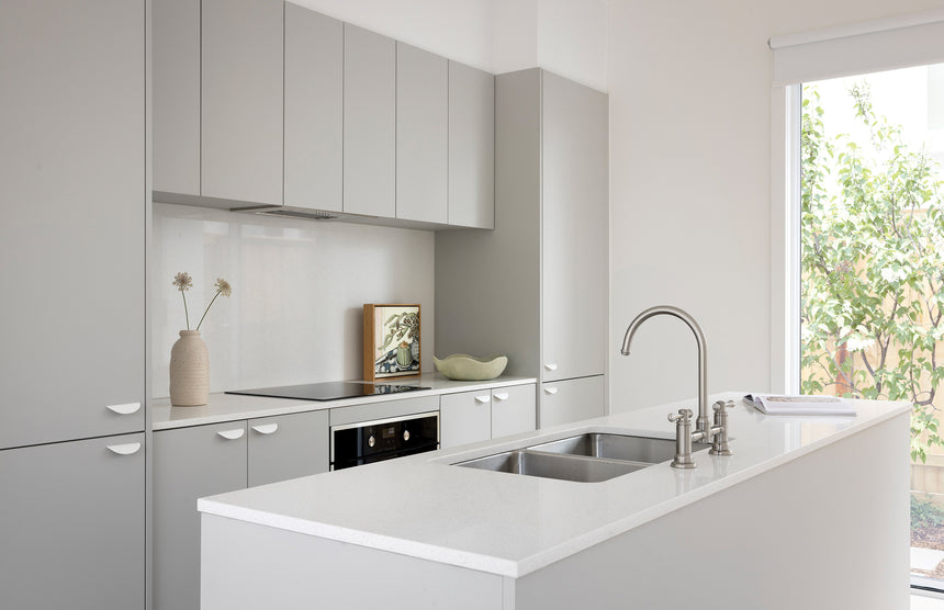 Phoenix Cromford Exposed Sink Set Brushed Nickel, shown in a finished interior