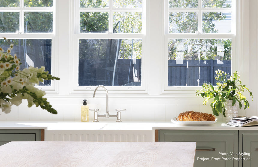 Phoenix Cromford Exposed Sink Set Brushed Nickel, shown in a finished interior