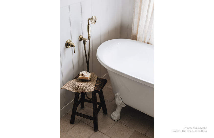 Phoenix Cromford Hand Shower Brushed Gold, shown in a finished interior