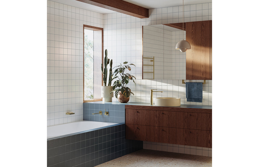Phoenix Five Flat Bar Heated Towel Ladder 550mm x 740mm Brushed Gold, shown in a finished interior