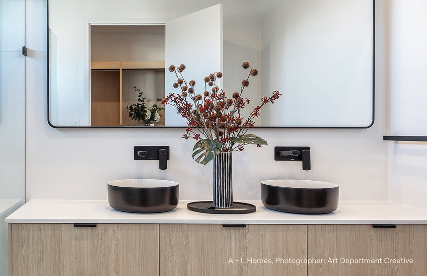Phoenix Teva Wall Basin / Bath Mixer Set 6 Star 200mm Trim Kit Only Matte Black, shown in a finished interior