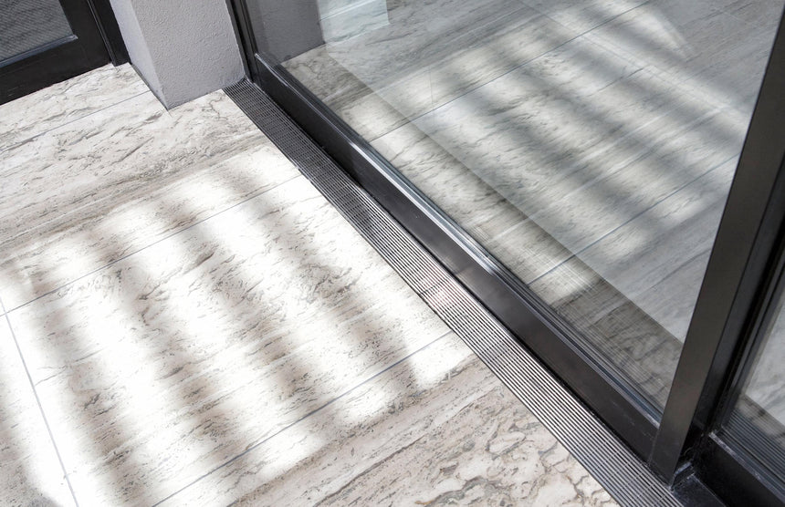 Phoenix V KIT Channel Drain HG 75 x 1215mm Outlet 45mm Stainless Steel, shown in a finished interior