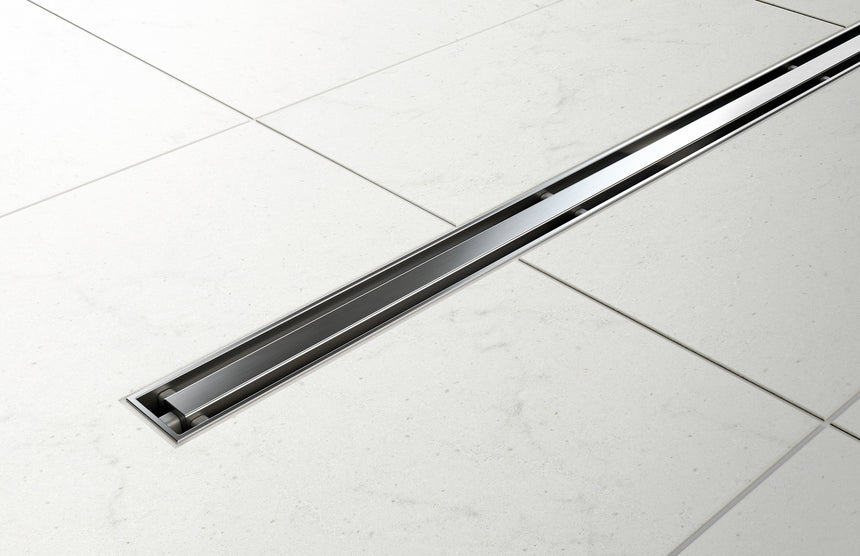 Phoenix Flat Slimline Channel Drain 30x750mm Outlet 65mm Matte Black, shown in a finished interior