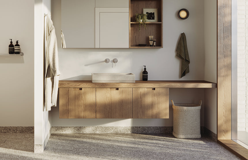 Phoenix Vivid Slimline SS 316 Wall Basin / Bath Mixer Set 180mm Stainless Steel, shown in a finished interior