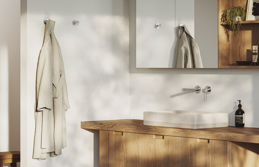 Phoenix Vivid Slimline SS 316 Wall Basin / Bath Mixer Set 180mm Stainless Steel, shown in a finished interior