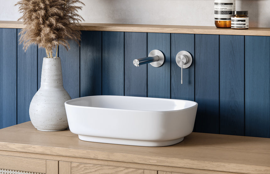 Phoenix Vivid Slimline SS 316 Wall Basin / Bath Mixer Set 180mm Stainless Steel, shown in a finished interior