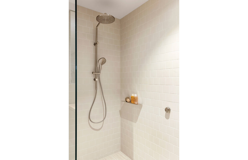 Phoenix Ormond Twin Shower Brushed Nickel, shown in a finished interior