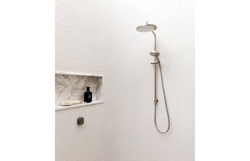 Phoenix Ormond Twin Shower Brushed Nickel, shown in a finished interior