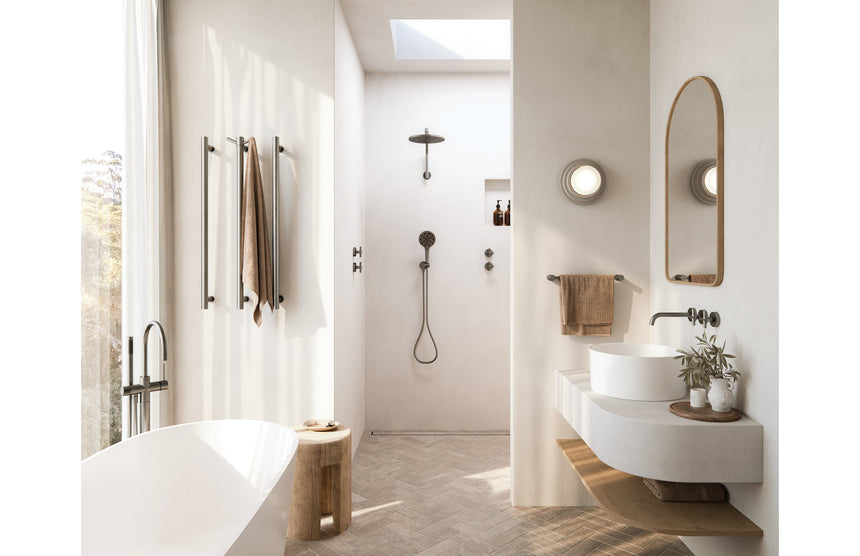Phoenix Vertical Rail Hook Round Brushed Nickel, shown in a finished interior