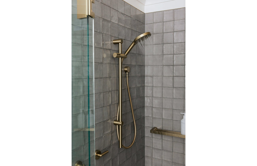Phoenix Vivid Slimline Plus Lever Wall Top Assemblies Brushed Gold, shown in a finished interior