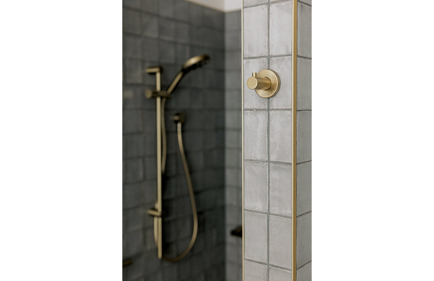 Phoenix Ormond Rail Shower Brushed Gold, shown in a finished interior