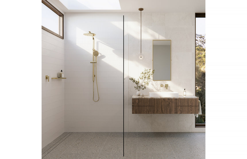 Phoenix Gloss Hand Towel Rail Brushed Gold, shown in a finished interior