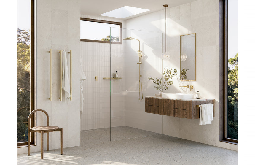 Phoenix Gloss MKII SwitchMix Shower / Wall Mixer Brushed Gold, shown in a finished interior