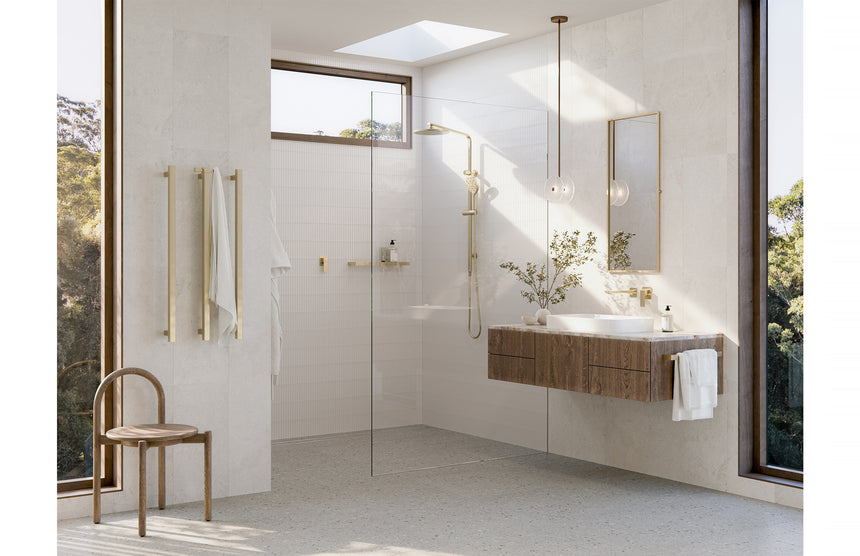 Phoenix Oxley Twin Shower Brushed Gold, shown in a finished interior