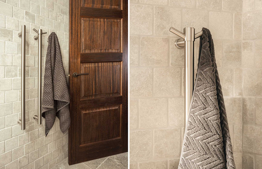 Phoenix Heated Triple Towel Rail Round 800mm Brushed Nickel, shown in a finished interior