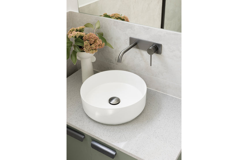 Phoenix Vivid Slimline SwitchMix Wall Basin / Bath Mixer Set 180mm Fit-Off Kit Brushed Carbon, shown in a finished interior