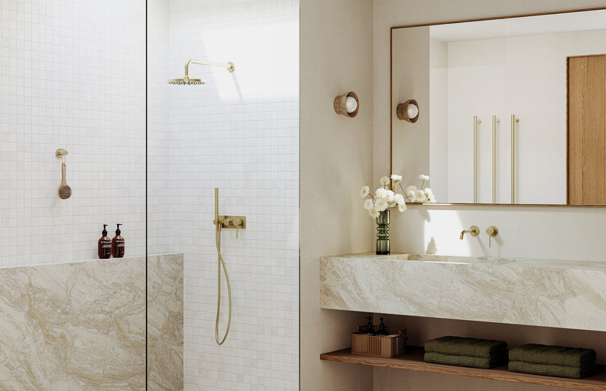Phoenix Vivid Slimline SwitchMix Wall Basin/Bath Mixer Set 60mm Backplates Fit-Off Kit Brushed Gold, shown in a finished interior