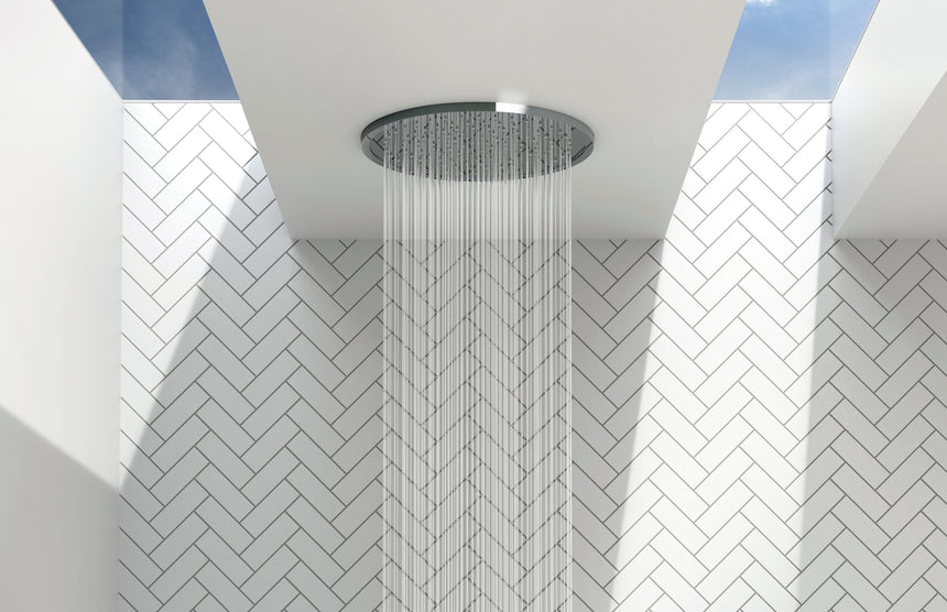 Phoenix Vivid Slimline Flush Mount Ceiling Shower 300mm Round Chrome, shown in a finished interior
