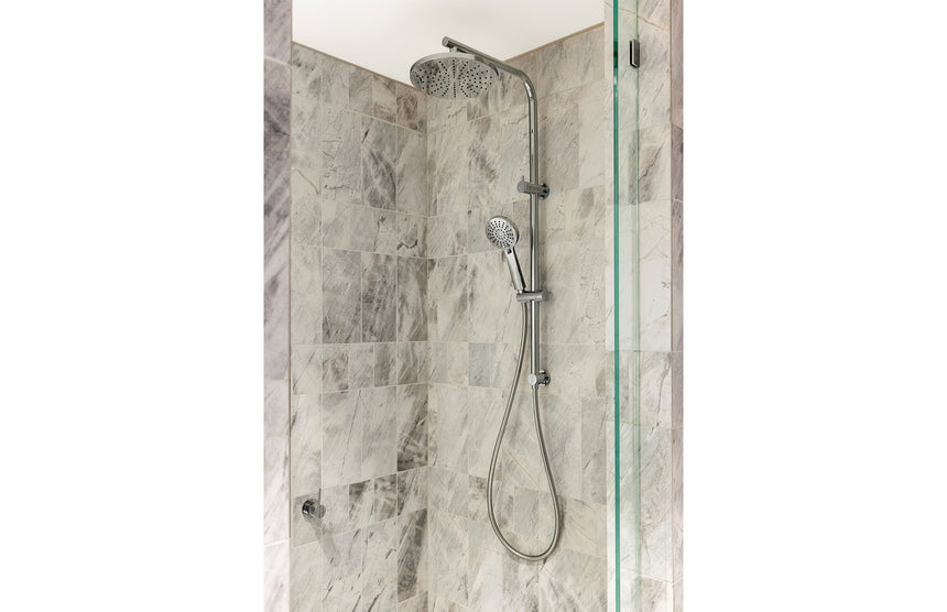 Phoenix Vivid Slimline Twin Shower Chrome, shown in a finished interior